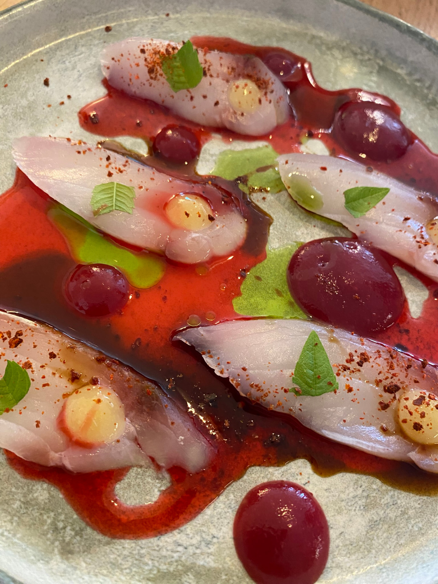 Cured kingfish crudo with beetroot, chilli and herbs