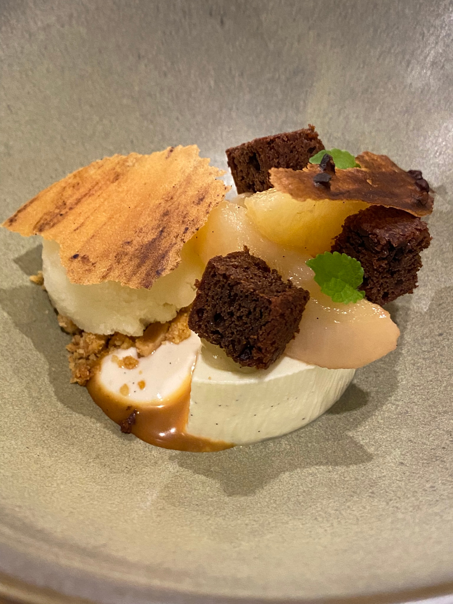 Vanilla parfait dessert with poached pear, brownie and caramel